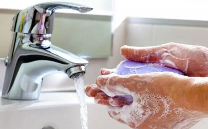 Wash hands with soap and water